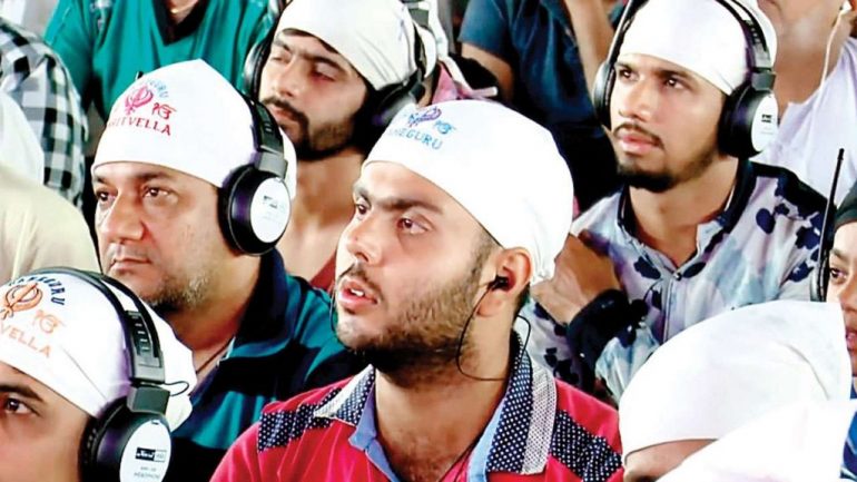 Gurudwara Distributes Headphones For Satsang
