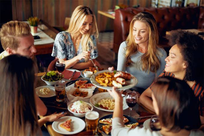 Studies Say People Tend To Eat More When They Dine With Friends & Family