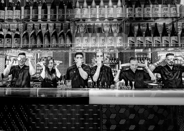 UNITED ARAB EMIRATES / Dubai /Bar with bartender at Zuma Restaurant in Dubai  United Arab Emirates Stock Photo - Alamy