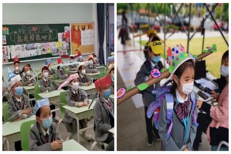 WATCH: Chinese Students Return To School With Specially Designed Social Distancing Hats