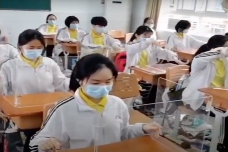 China Schools Use Foldable Transparent Screen To Keep Social Distance While Eating