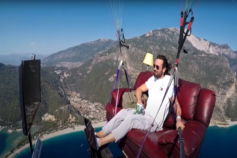 Turkish Man Paraglides At Home While Watching TV & Munching On Chips; Video Goes Viral