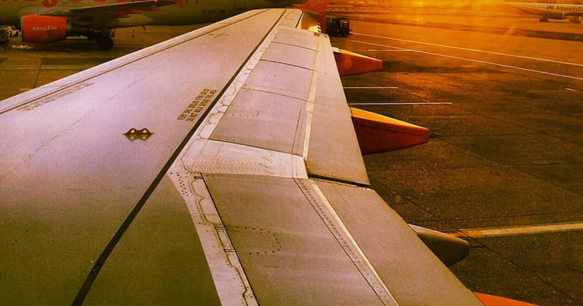 Passenger Casually Opens Emergency Exit & Takes Walk On Aircraft Wing As She Felt “Too Hot”