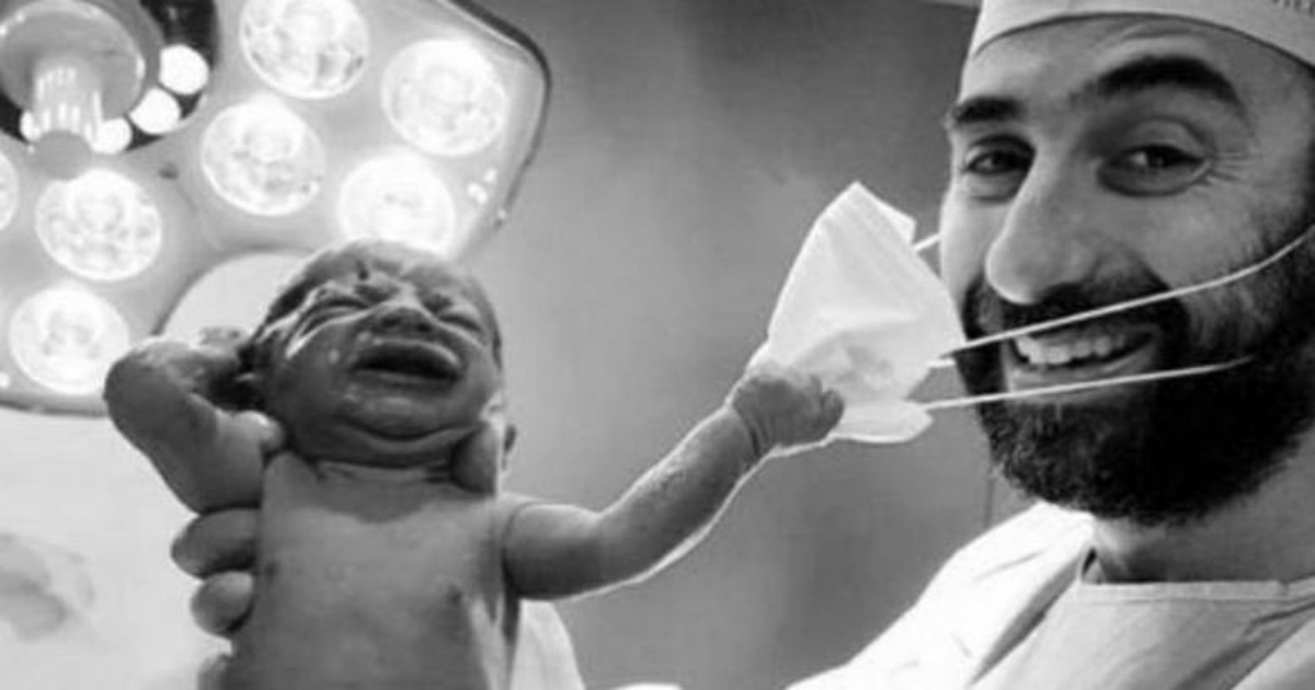 Newborn Removes Dubai Doc’s Facemask; Viral Picture Becomes Symbol Of Hope