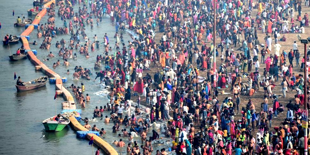 Social Distancing Thrown Out Of Window As Millions Of People Take Dip In River In Magh Mela