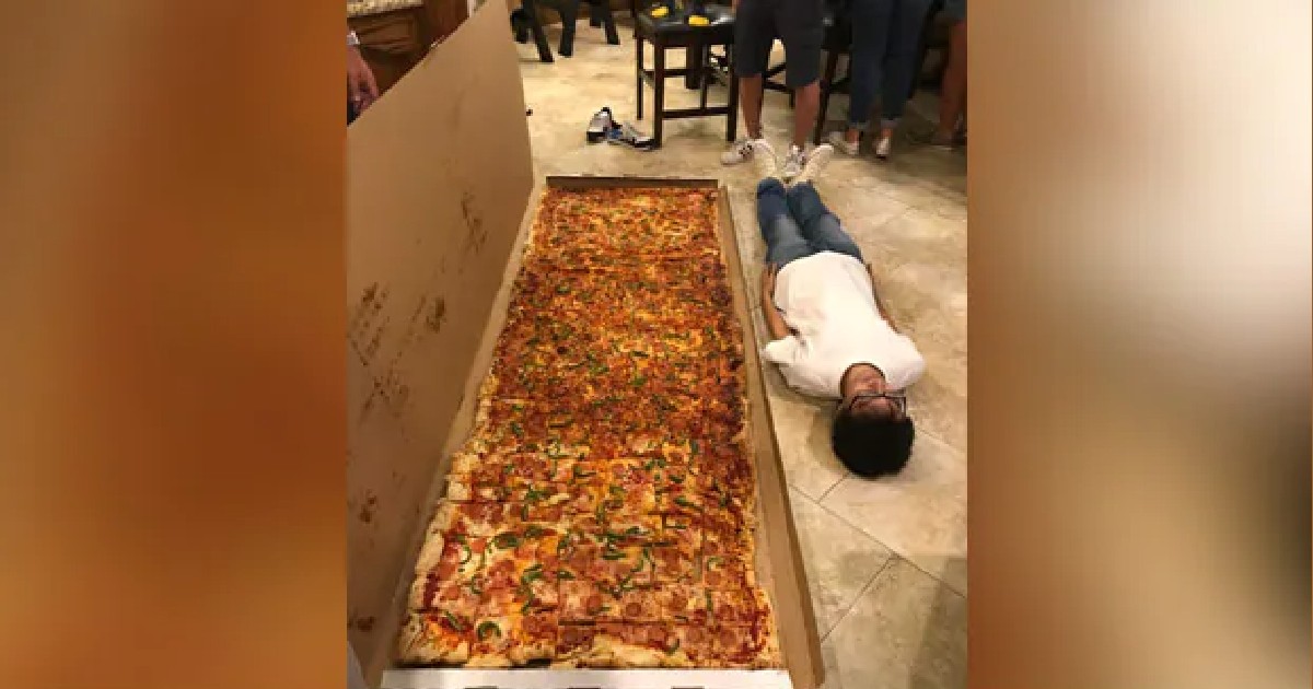 Biggest Pizza, As Tall As An Adult Man Takes Internet By Storm; Netizens React