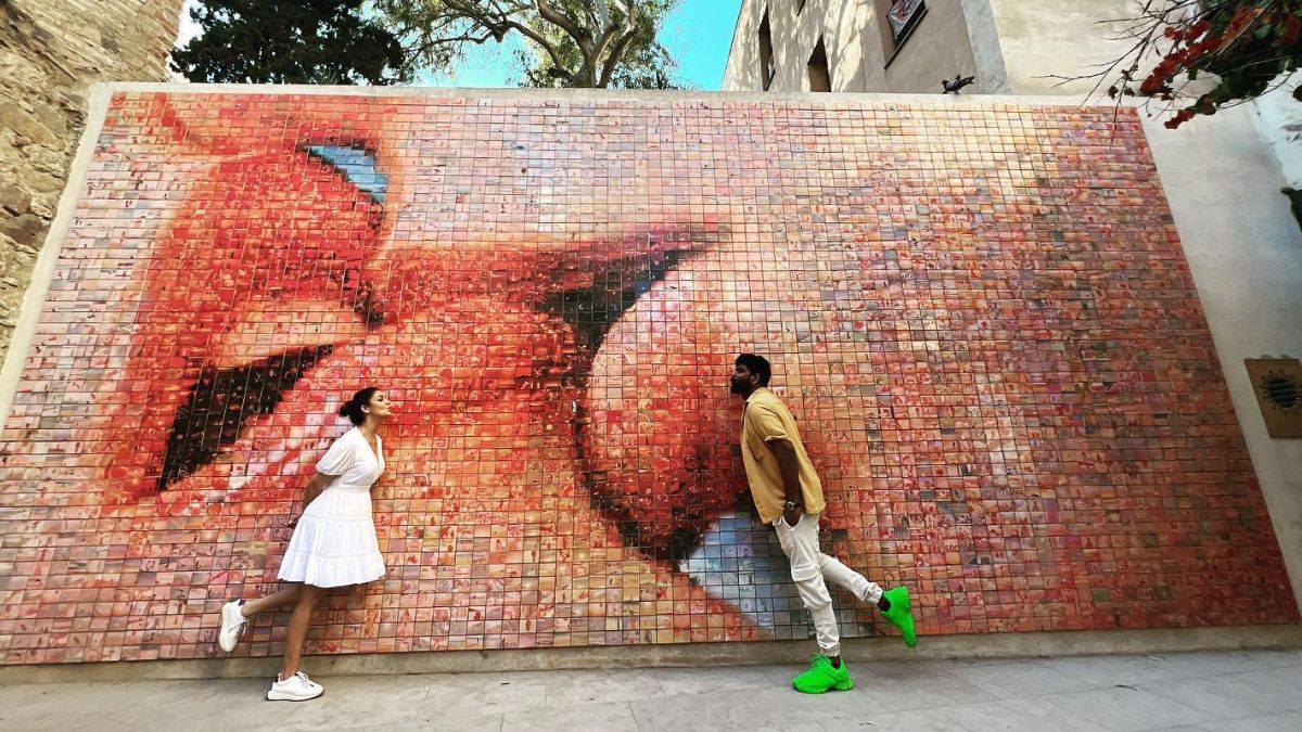 Nayanthara And Vignesh Shivan Pose Sweetly At Barcelona’s Kiss Wall