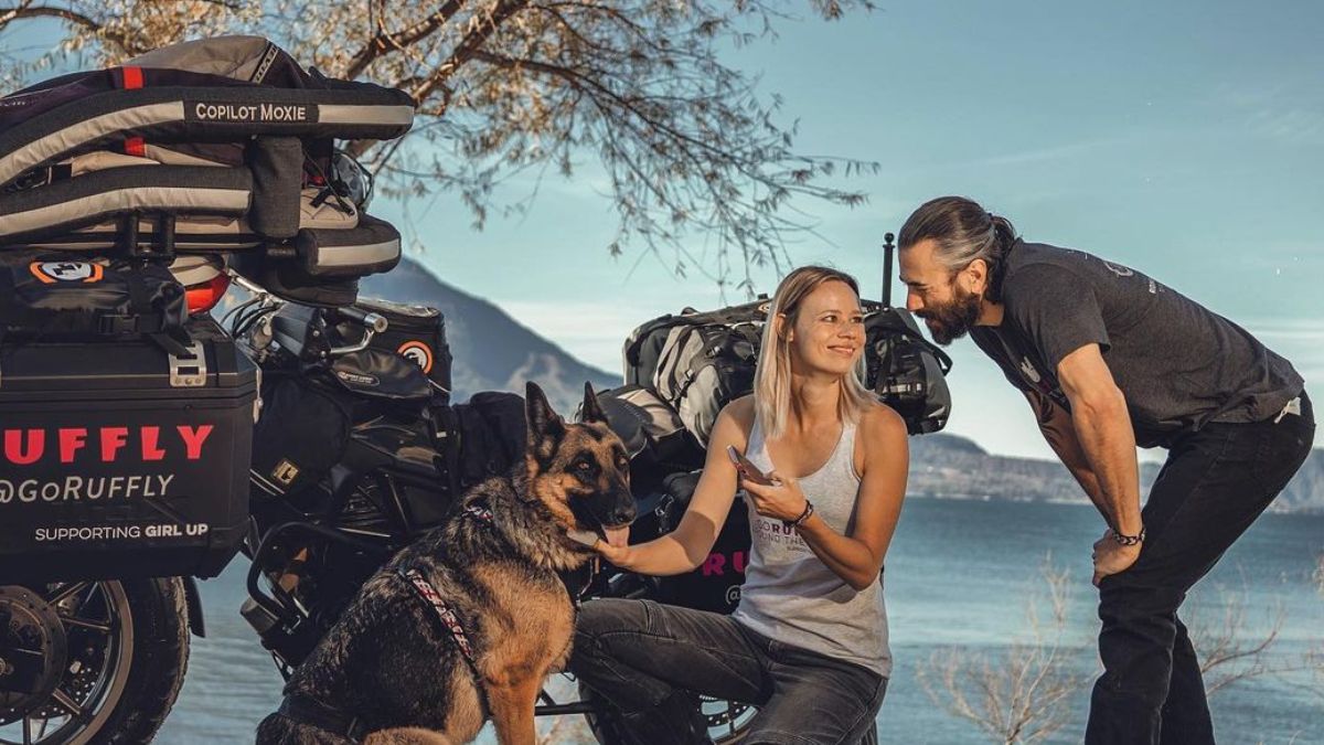 This Globetrotting Couple And Their Pawdorable German Shepherd Have Travelled To 90 Countries On A Bike