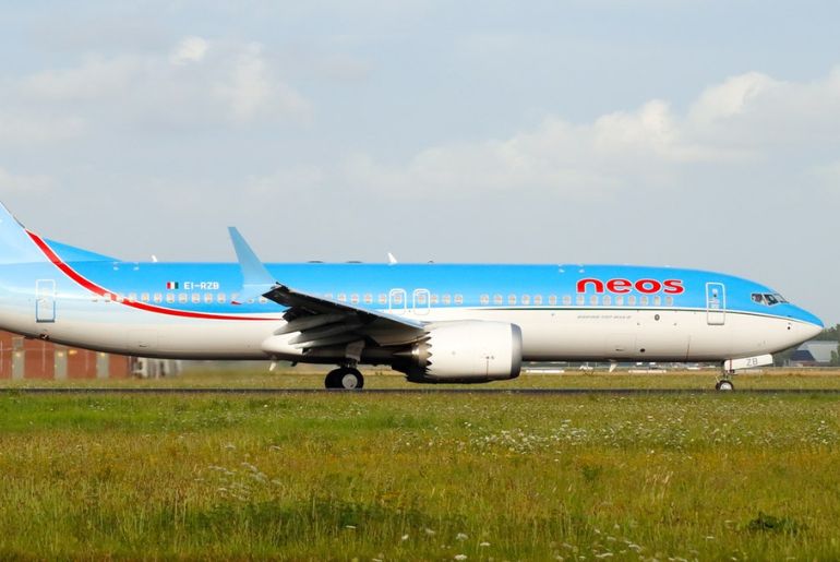 neos airline amritsar to italy 
