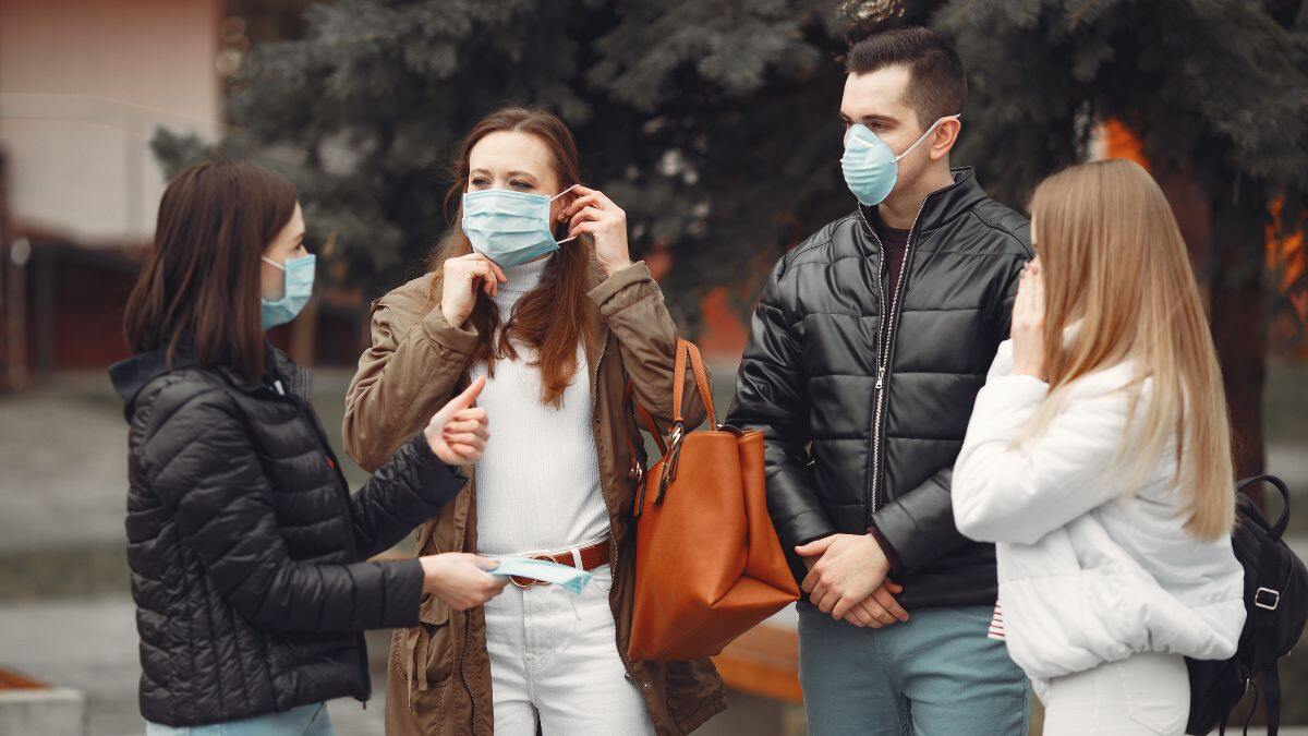 COVID-19 Cases Surge In Some Asian Countries; Face Masks & Scanners Return At Airports