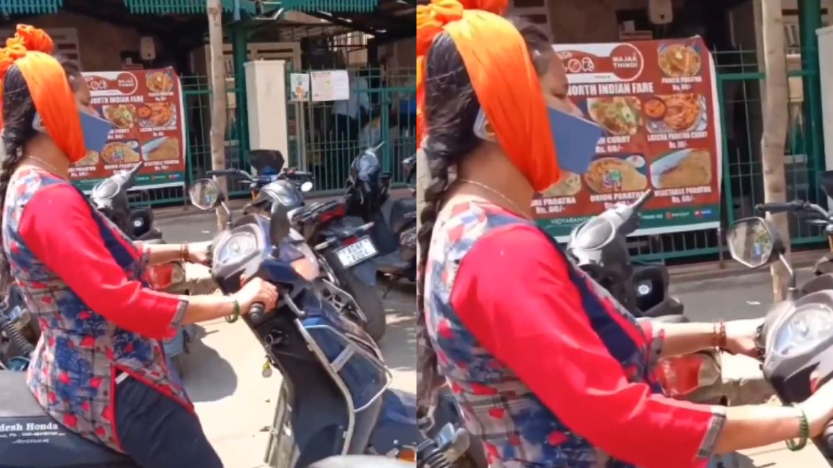 Bengaluru Woman’s Phone “Jugaad” While Riding Two-Wheeler Sparks Safety Concerns; Netizens Say, “India Is Not For Beginners”