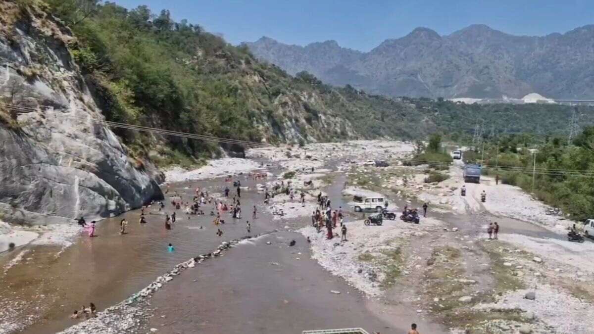 Jammu & Kashmir’s Reasi District Temperatures Soar To 42°C; People Bathe In Anji River To Cool Off