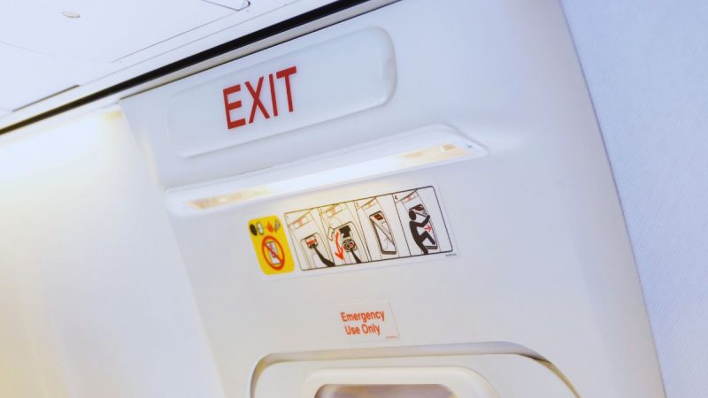 Man Open Emergency Exit