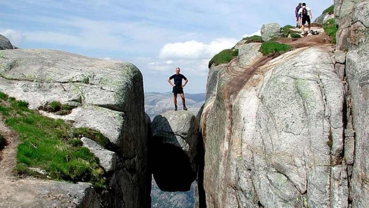 Kjeragbolten, The Stunning Natural Wonder In Norway Lets You Stand On A Rock Perched 984 Metres Above The Fjord