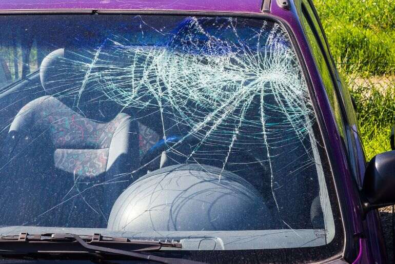 Minibus Collides With Car