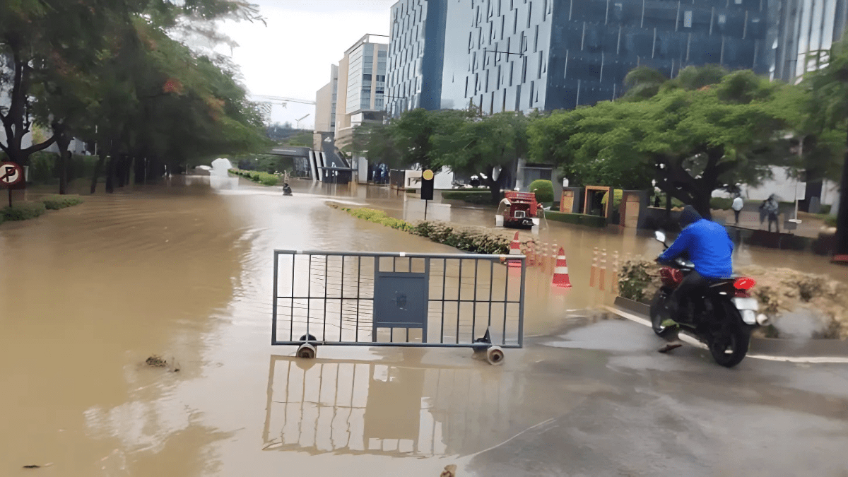 Heavy Rainfall Triggers Flooding In Bengaluru, Submerges Roads And Disrupts Traffic Flow