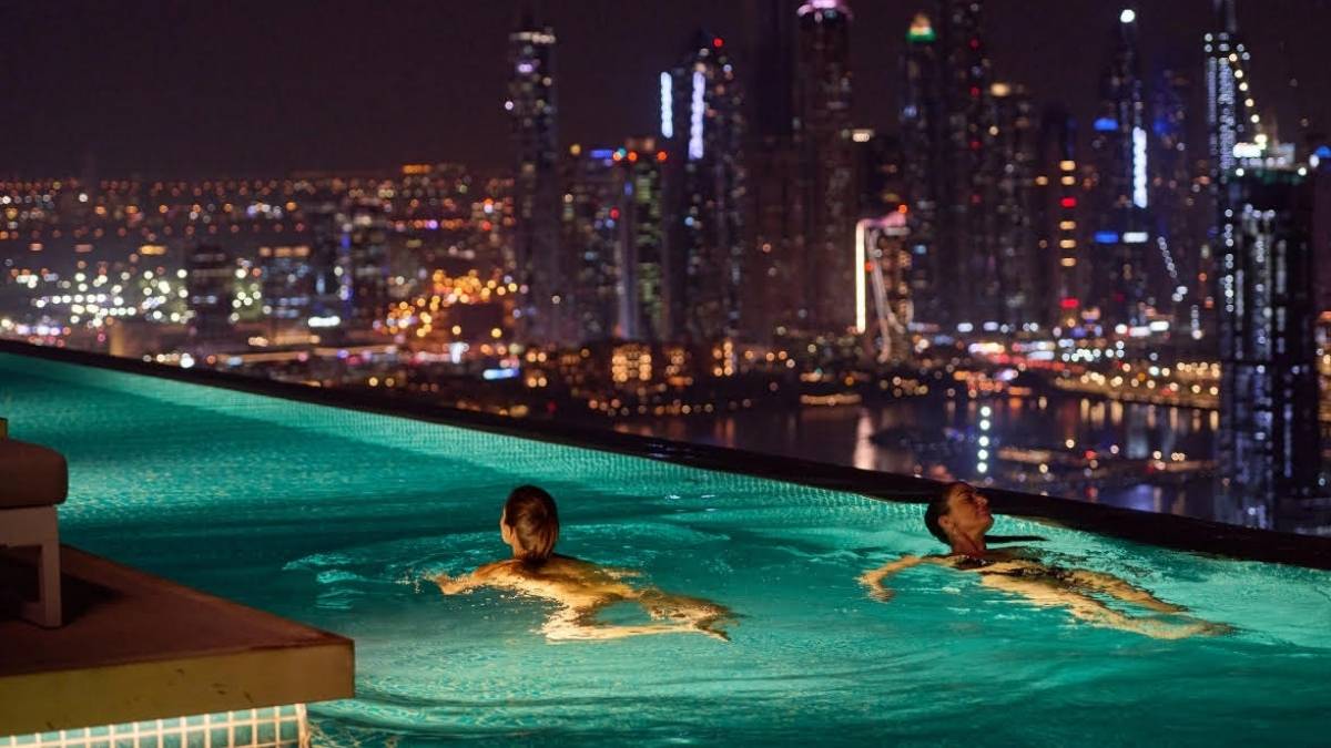 For Just AED 225 Per Person, Dive Into Aura Skypool’s First-Ever Family Night Swim Session In Dubai