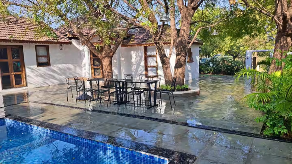 At ₹6,848/Night, This Villa In Ahmedabad Comes With A Sparkling Pool, Lush Neem Trees, And Chef-Prepared Meals