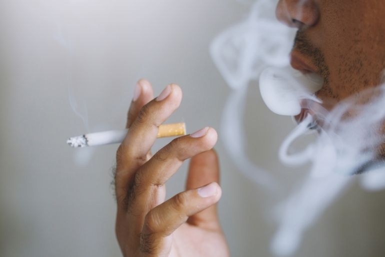 smoking man at restaurant