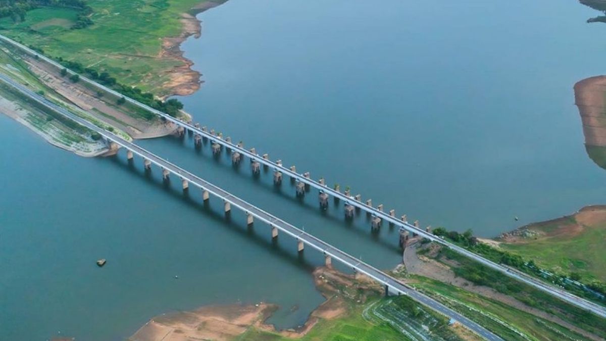 Just 25 Km From Mysuru, Sits A Small Hamlet Where Train Tracks & Roads Run Over Backwaters