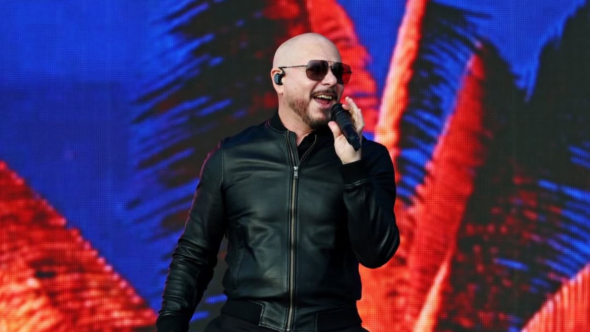 Why Does Pitbull Want His Fans To Wear Bald Caps?