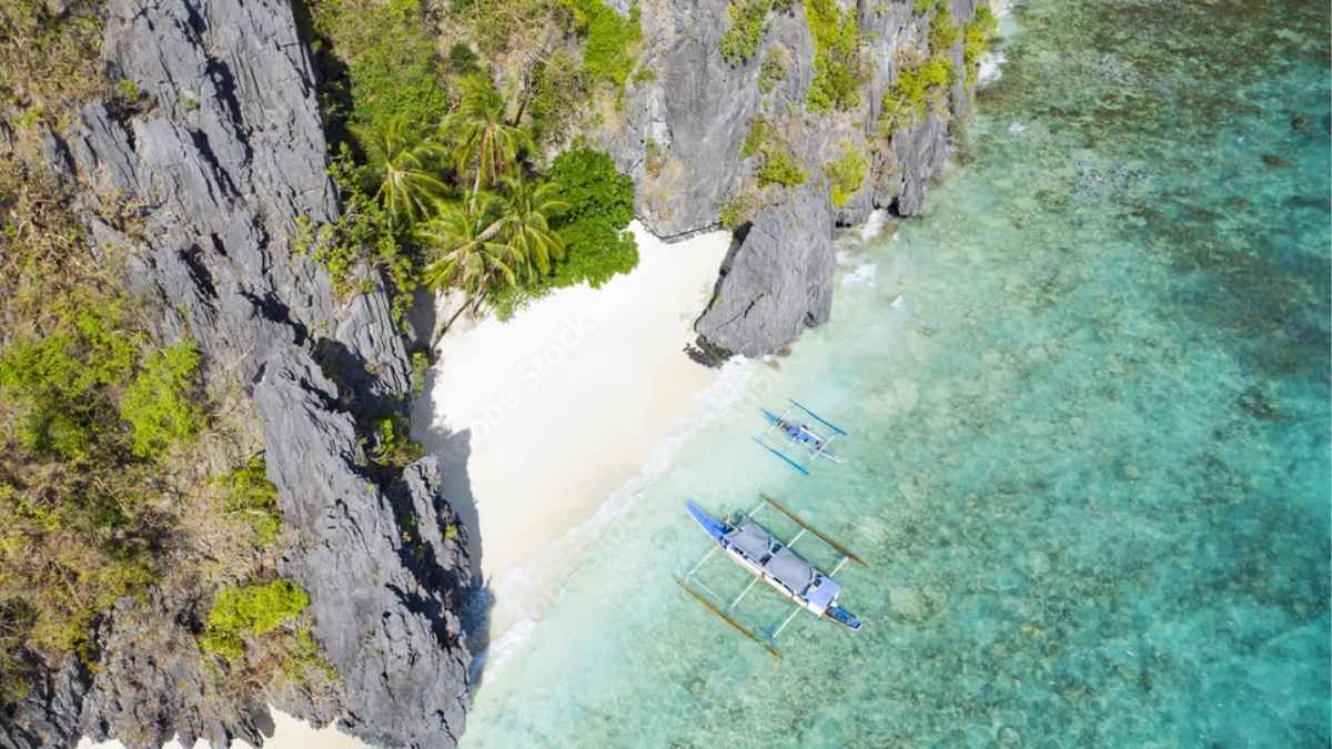 With Dramatic Limestone Cliffs & Pristine Water, Entalula Beach Is A Stunning Escape In The Philippines