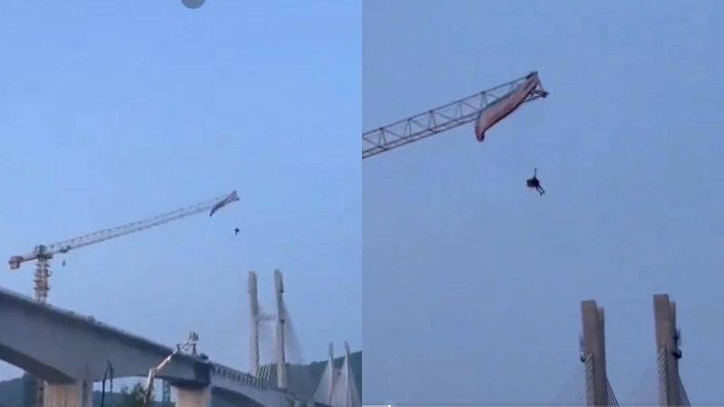 Paraglider Stuck 60 Metres Mid-Air After Strong Wind Lands Him On Crane In China
